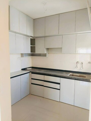 Kitchen in 2 BHK Apartment at Choice Goodwill Metropolis West, Lohgaon – for Sale