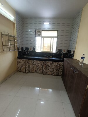 Kitchen in 1 BHK Apartment at Balkum Pada – for Sale