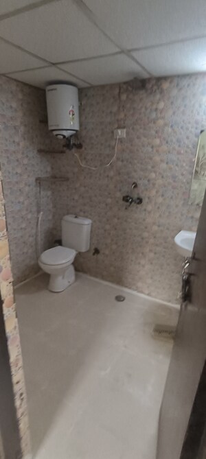Bathroom in 2 BHK Apartment at Aims Golf City, Sector 75 – for Rent