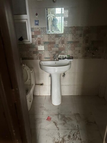 Bathroom in 2 BHK Apartment at AFOWO Raksha Addela, Sector 16c Greater Noida – for Sale