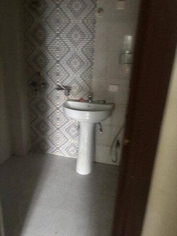 Bathroom in 2 BHK Apartment at AFOWO Raksha Addela, Sector 16c Greater Noida – for Sale