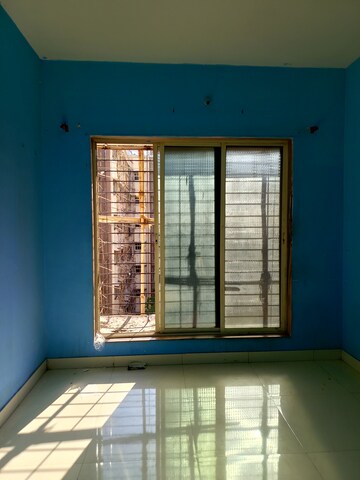 Room in 1 BHK Apartment at Dharti Orange Heights, Morya Nagar – for Rent