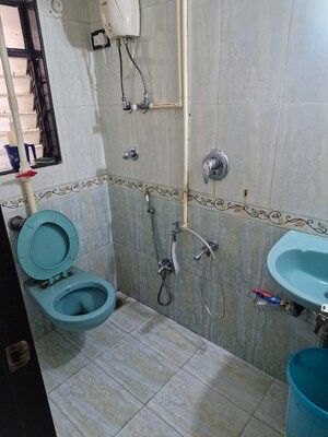 Bathroom in 1 BHK Apartment at Atul Blue Arch, Kandivali West – for Sale