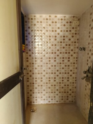 Bathroom in 1 BHK Apartment at Navkar Building, Nalasopara West – for Rent