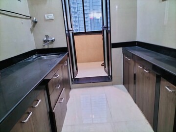 Kitchen in 1 BHK Apartment at K Raheja Raheja Residency, Malad East – for Rent