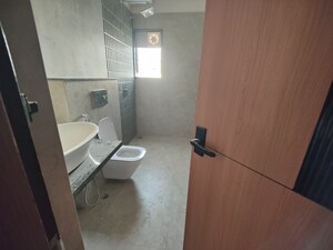 Bathroom in 4 BHK Apartment at Uttorayon Township – for Rent