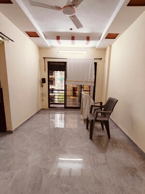 Living Room in 1 BHK Apartment at Dharti Orange Heights, Morya Nagar – for Rent