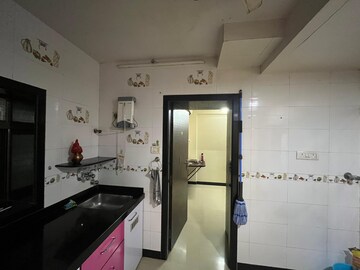 Kitchen in 1 BHK Apartment at Gokuldham Complex, Goregaon East – for Rent