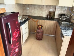 Kitchen in 3 BHK Apartment at Amrapali Crystal Homes, Sector 76 – for Rent