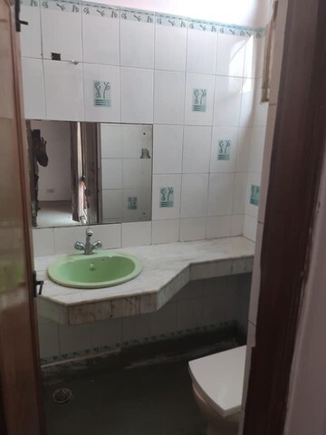Bathroom in 3 BHK Builder Floor at RWA Flats Pocket 40, Kalkaji – for Rent