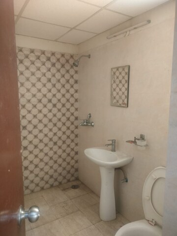 Bathroom in 3 BHK Apartment at Gardenia Golf City, Sector 75 – for Rent