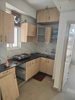 Kitchen in 2 BHK Apartment at Supertech Cape Town, Sector 74 – for Rent