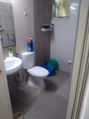 Bathroom in 3 BHK Apartment at Amrapali Silicon City, Sector 76 – for Rent