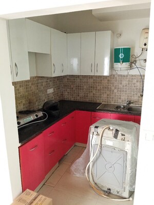 Kitchen in 2 BHK Apartment at Amrapali Princely Estate, Sector 76 – for Rent