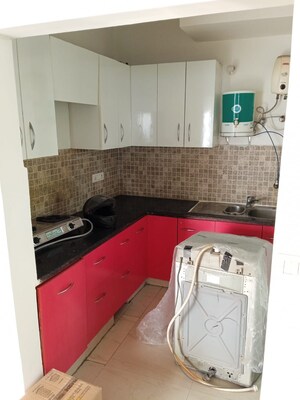 Kitchen in 2 BHK Apartment at Amrapali Princely Estate, Sector 76 – for Rent