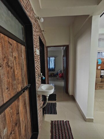 Building Lobby in 1 BHK Apartment at Meenakshi Co Operative Society, Nerul – for Rent