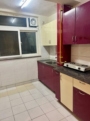 Kitchen in 3 BHK Apartment at Amrapali Silicon City, Sector 76 – for Rent
