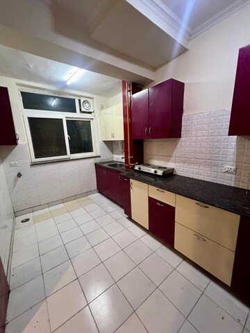 Kitchen in 3 BHK Apartment at Amrapali Silicon City, Sector 76 – for Rent