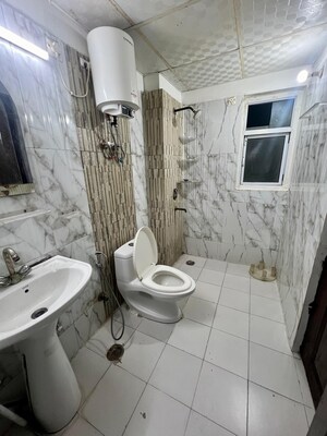 Bathroom in 3 BHK Apartment at Amrapali Silicon City, Sector 76 – for Rent