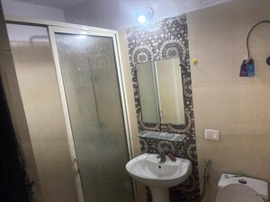 Bathroom in 2 BHK Apartment at Prateek Wisteria, Sector 77 – for Rent