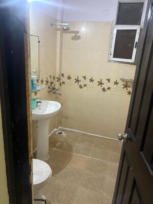 Bathroom in 2 BHK Apartment at Prateek Wisteria, Sector 77 – for Rent