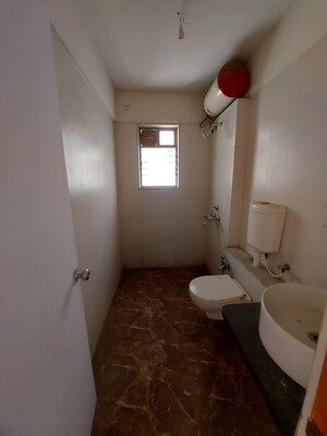 Bathroom in 3 BHK Apartment at Atul Blue Meadows, Andheri East – for Rent