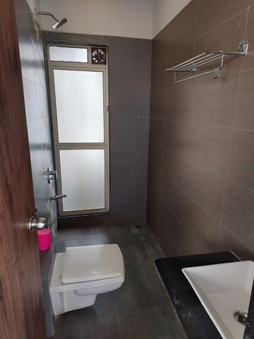 Bathroom in 3 BHK Apartment at Atul Blue Meadows, Andheri East – for Rent