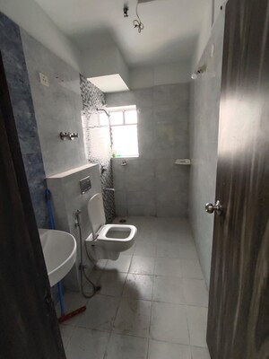 Bathroom in 3 BHK Apartment at Pradhan Nagar – for Sale