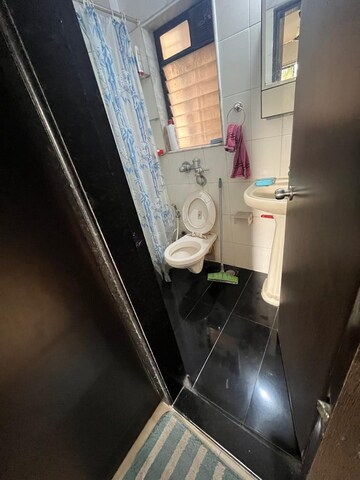 Bathroom in 1 BHK Apartment at Gokul Nagari CHS, Kandivali West – for Sale