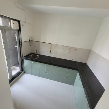 Kitchen in 2 BHK Apartment at Ashar Metro Towers, Vartak Nagar – for Rent