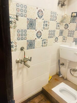 Bathroom in 3 BHK Builder Floor at Dwarka Mor – for Rent