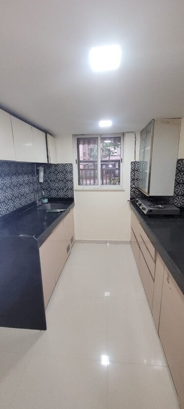 Kitchen in 1 BHK Apartment at Lodha Amara, Kolshet Road – for Rent