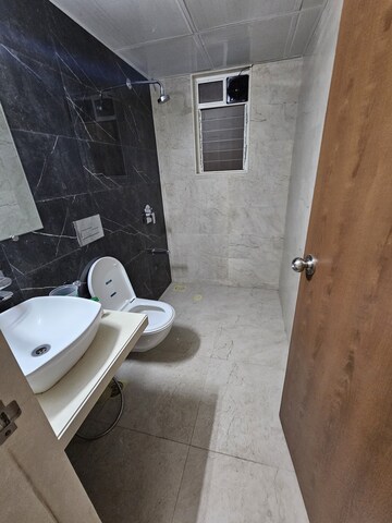 Bathroom in 2 BHK Apartment at Dosti West County Phase 4 Dosti Pine, Balkum Pada – for Rent