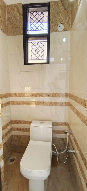 Bathroom in 2 BHK Builder Floor at Dwarka Mor – for Sale