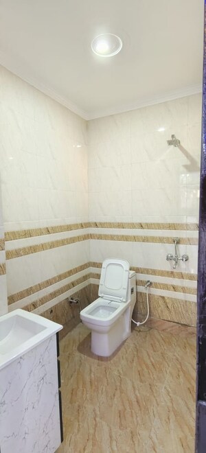 Bathroom in 2 BHK Builder Floor at Dwarka Mor – for Sale