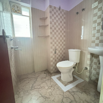 Bathroom in 2 BHK Apartment at Sunland Residency, Bablatala – for Sale