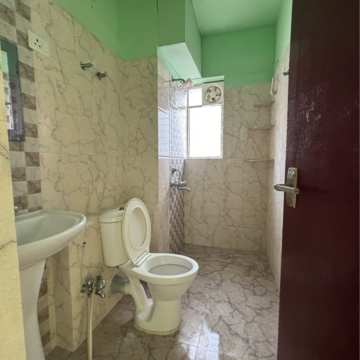 Bathroom in 2 BHK Apartment at Sunland Residency, Bablatala – for Sale