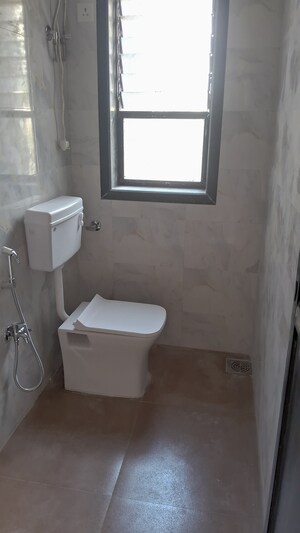 Bathroom in 2 BHK Apartment at Channal Classic Apartment, Kopar Khairane – for Rent