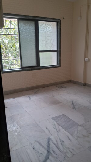 Room in 2 BHK Apartment at Channal Classic Apartment, Kopar Khairane – for Rent