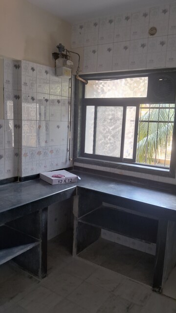 Kitchen in 2 BHK Apartment at Channal Classic Apartment, Kopar Khairane – for Rent