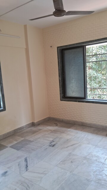 Master Bedroom in 2 BHK Apartment at Channal Classic Apartment, Kopar Khairane – for Rent