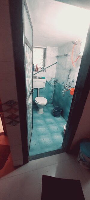 Bathroom in 1 BHK Apartment at Kharegaon – for Sale