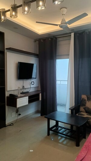 Living Room in 3 BHK Apartment at Antriksh Golf View, Sector 78 – for Rent