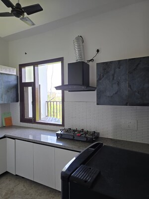 Kitchen in 3 BHK Builder Floor at Motia Blue Ridge, Dhakoli – for Rent