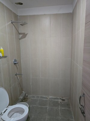 Bathroom in 3 BHK Builder Floor at Motia Blue Ridge, Dhakoli – for Rent