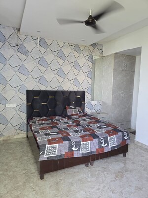 Bedroom in 3 BHK Builder Floor at Motia Blue Ridge, Dhakoli – for Rent