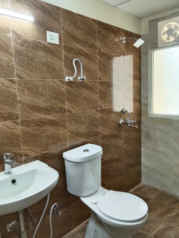 Bathroom in 3 BHK Apartment at Amrapali Crystal Homes, Sector 76 – for Rent