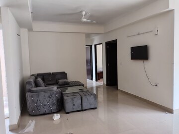 Living Room in 3 BHK Apartment at Amrapali Crystal Homes, Sector 76 – for Rent