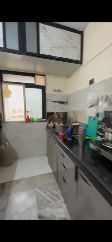 Kitchen in 2 BHK Apartment at Ganga Jangid Complex, Mira Road East – for Rent