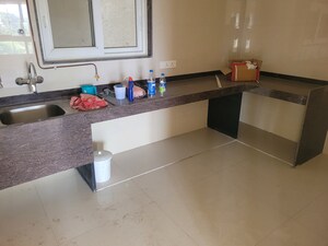 Kitchen in 4 BHK Apartment at Ethique Hrishikesh CHS, Model Colony – for Rent